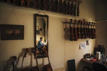 Hugh Withycombe's violin workshop in Gorman House looks exactly as you expect it to. Photo: Rohan Thomson