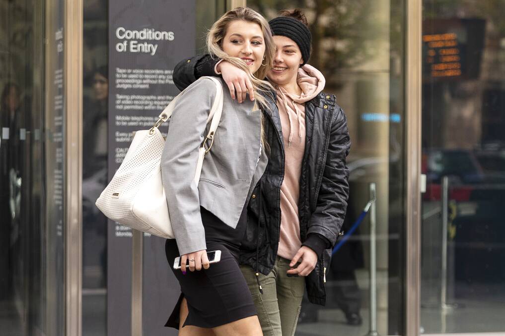 Caris Underwood (left) is seen leaving the Victorian County Court.  Photo: AAP