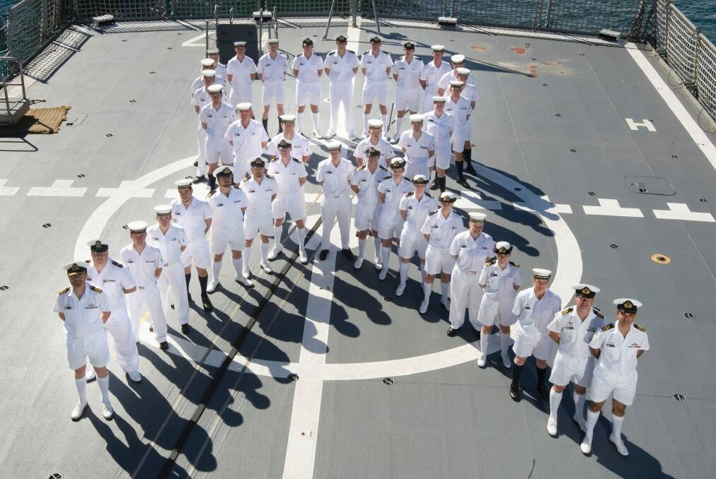HMAS Warramunga crew show their support for efforts to White Ribbon Day, which raises money to eliminate violence against women. Photo: Defence Department