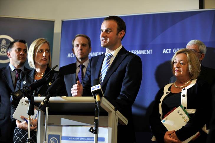 ACT Budget 2012-13 ... Treasurer Andrew Barr addresses the media, surrounded by fellow ministers. Photo: Jay Cronan