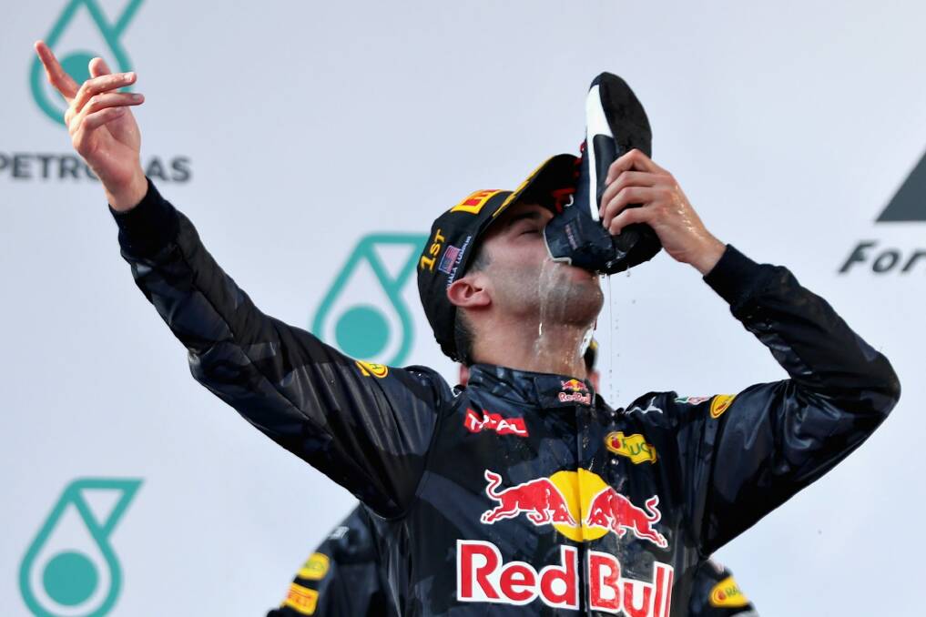 Australian F1 driver Daniel Ricciardo started the "shoey'' phenomenon. Photo: Mark Thompson