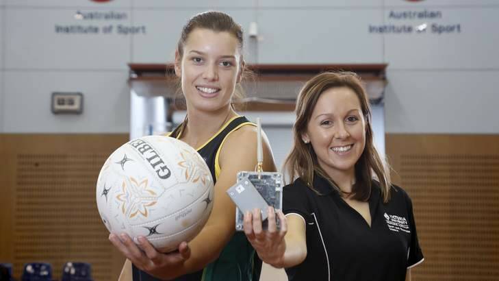Sport,  from left, U-21 World Youth Squad member Micaela Wilson and Victoria University PHD student Alice Sweeting with a RF tracking system at AIS. Photo: Jeffrey Chan