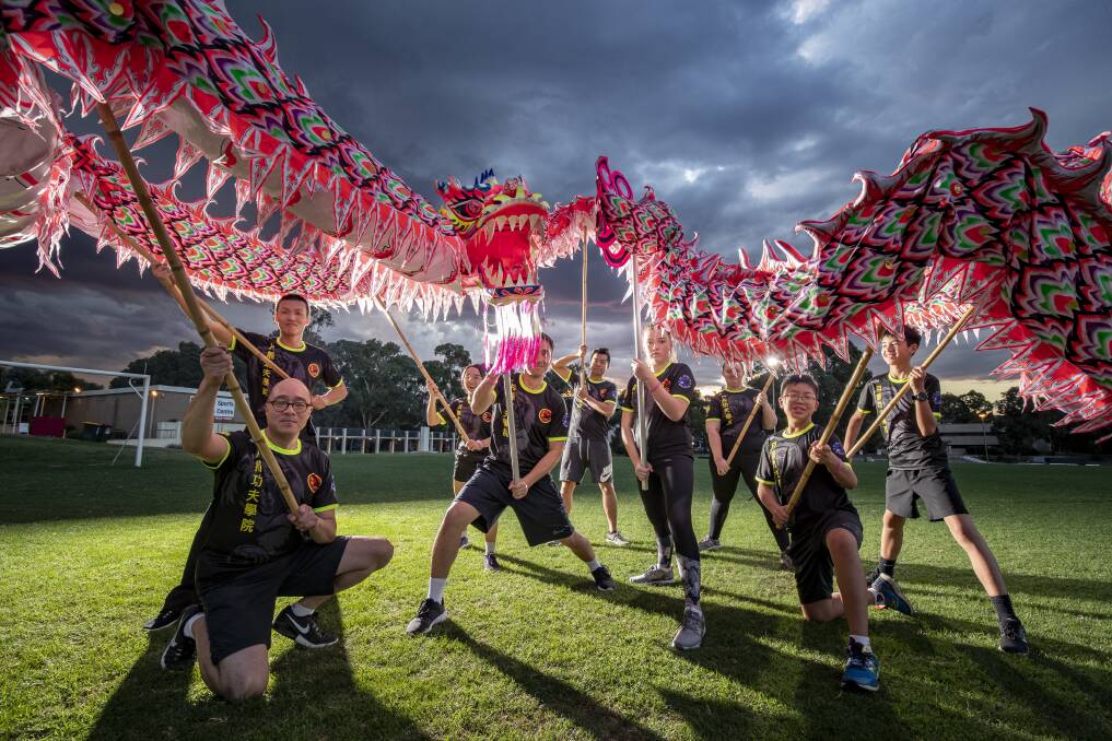 Canberra Dragon Dance members finish a training session at the University of Canberra. Photo: Sitthixay Ditthavong