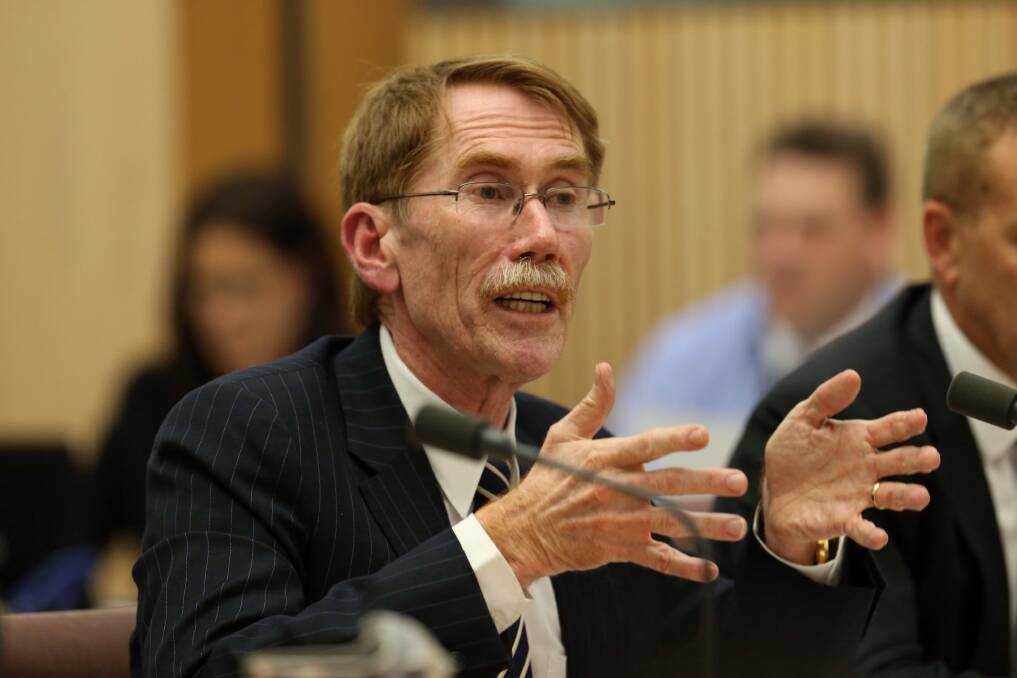 Professor Ian Young, Vice-Chancellor of the ANU, was jeered by angry School of Music students. Photo: Andrew Meares
