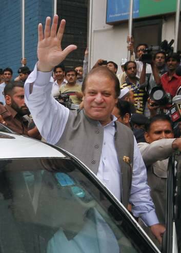 Nawaz Sharif arrives to cast his vote in the general election in Lahore in May 2013. Photo: Reuters/Mohsin Raza