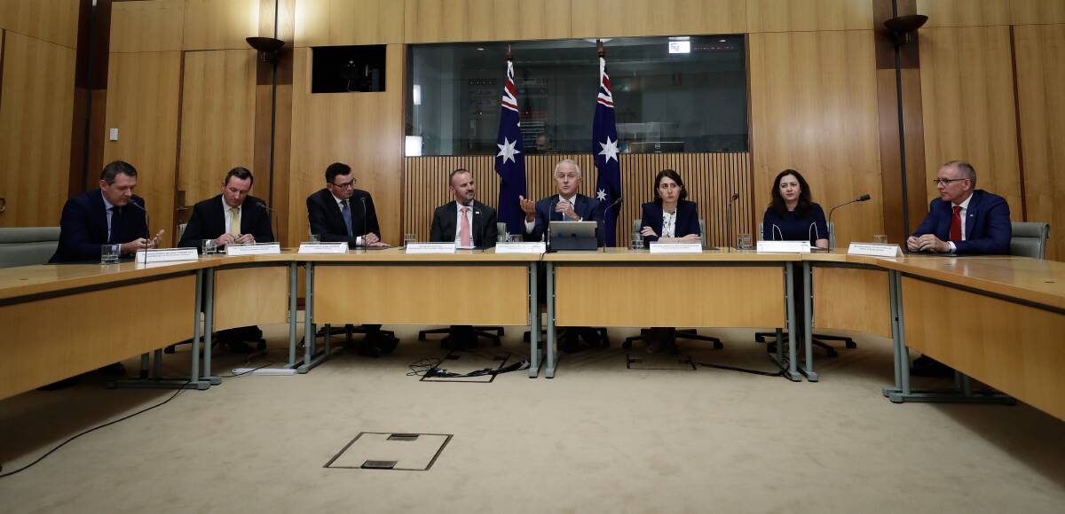 ACT Chief Minister Andrew Barr, then prime minister Malcolm Turnbull, and NSW Premier Gladys Berejiklian. The ACT is the only jurisdiction that does not refer to ministers as "the Honourable". Photo: Alex Ellinghausen