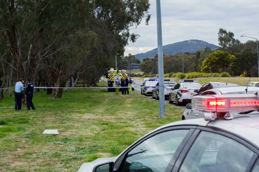 Police and fire brigade on the scene of the police operation beside Drakeford Drive near Soward Way. Photo: Rohan Thomson