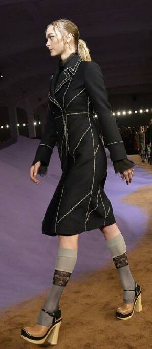 Gemma Ward returned to the catwalk by opening the Prada show at Milan Fashion Week.