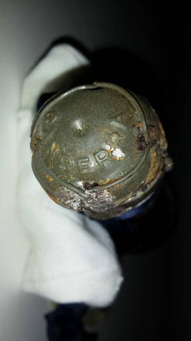The curious ''Canberra'' cork from a bottle of champagne smashed over the bow of the MV Dolphin at Huskisson in 1936. Photo: Jervis Bay Maritime Museum