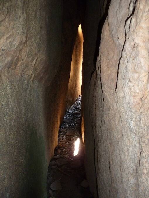 Light makes its way into a rock split at "The Lintels" in Namadgi National Park. Photo: Matthew Higgins