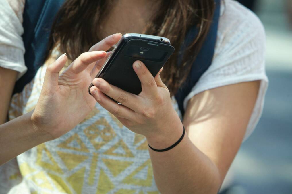 Compulsive texting is a recognised syndrome in Japan. Photo: Glenn Hunt