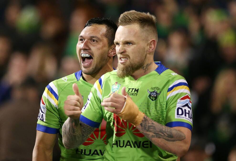 Jordan Rapana and Blake Austin celebrate against the Panthers. Photo: Getty Images