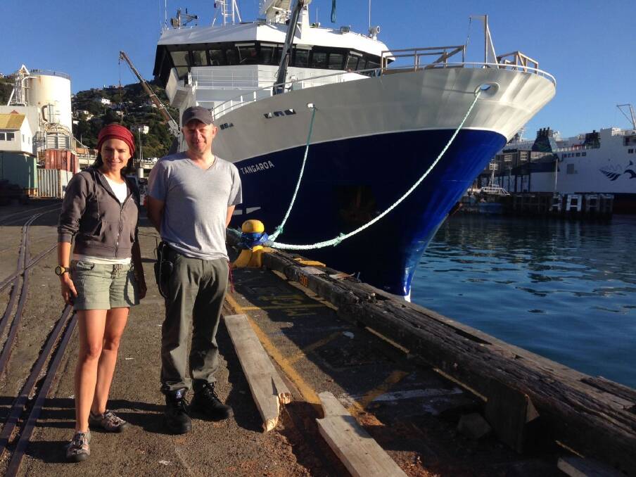 Australian scientists Dr Nat Schmitt and Dr Mike Double in front of the research vessel in Wellington allowing them to study blue and humpback whales throughout the Southern Ocean.  Photo: Photo by Dave Allen, National Institute of Water and Atmospheric Research.