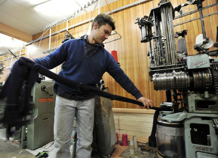 Sock maker and business owner Andrew Lindner of Lindner Quality socks in Crookwell shows the process behind making socks. Photo: Jay Cronan