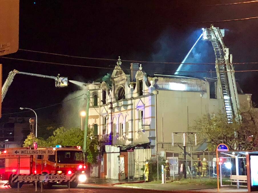 Fire crews brought in aerial appliances to fight the flames that destroyed the hotel in September. Photo: Supplied - Dan Walker