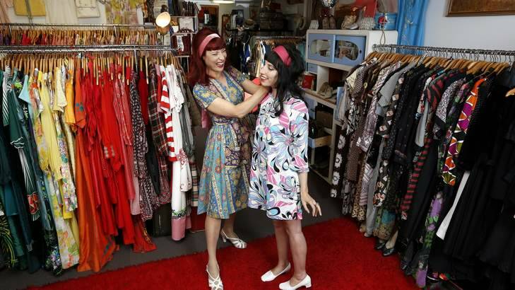 Netti from April's Caravan helps Gina Poulakis get all frocked up. Photo: Jeffrey Chan