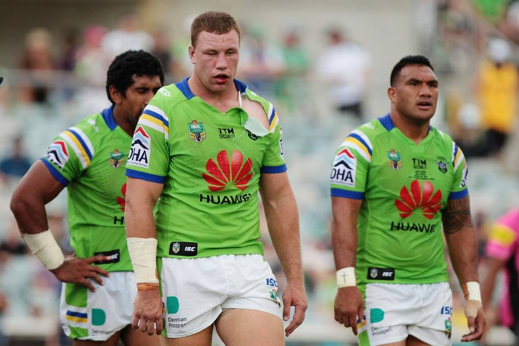 Exhausted Raiders forwards Sia Soliola, Shannon Boyd and Jeff Lima during Saturday's win over Penrith.  Photo: Getty Images