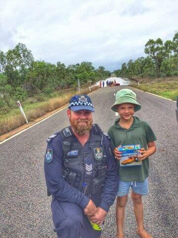 Police from Charters Towers in the Townsville District have been out and about over the past few weeks, assisting with the evacuation of stranded motorists and the re-supply of grazing property owners in the area. Photo: Queensland Police Service