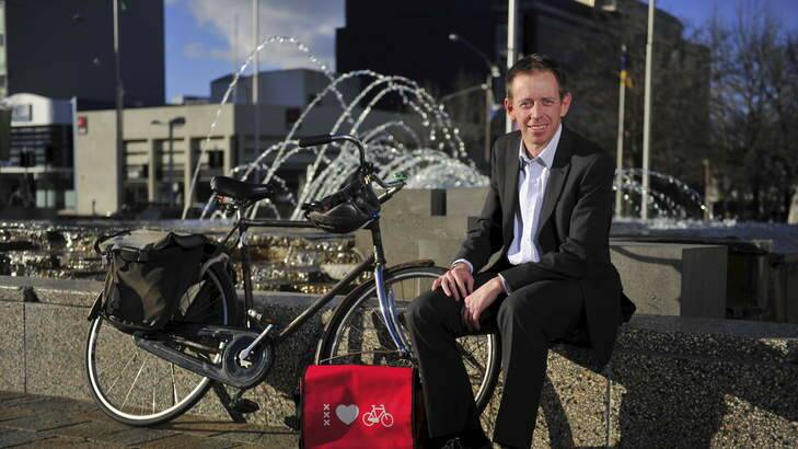 Shane Rattenbury Greens ACT MLA, with his bike at Civic Square. Photo: Jay Cronan