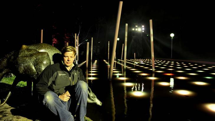 Lighting designer with mandylights, Mike Gerin. at the Kangaroo Pond when lit up for the very first time. Photo: Melissa Adams