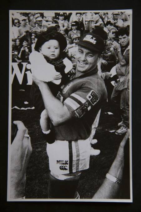 David Furner and his daughter Maddison after the Raiders' 1994 grand final triumph. Photo: Canberra Times