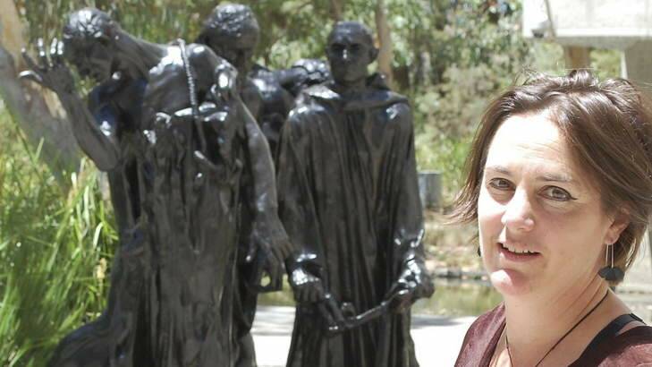 National Gallery of Australia curator Lucina Ward with castings of figures from Rodin's <em>The Burghers of Calais</em>.