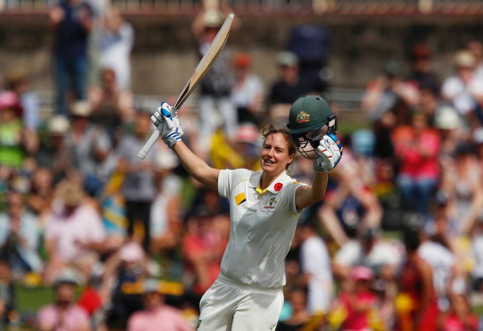 Record-breaker: Australia's Ellyse Perry on her way to a double-century. Photo: AAP