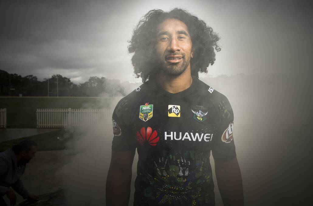 Sia Soliola modelling the jersey that will be auctioned off for the Kato Ottio memorial fund.