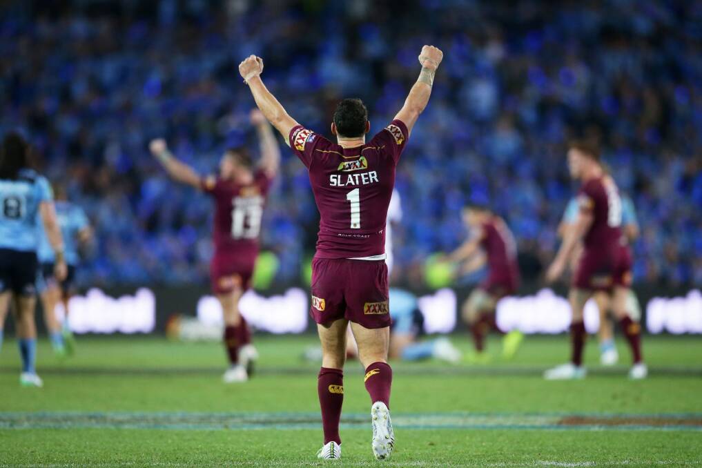 Billy Slater of the Maroons celebrates victory at the end of game two of the State Of Origin series. Photo: Matt King