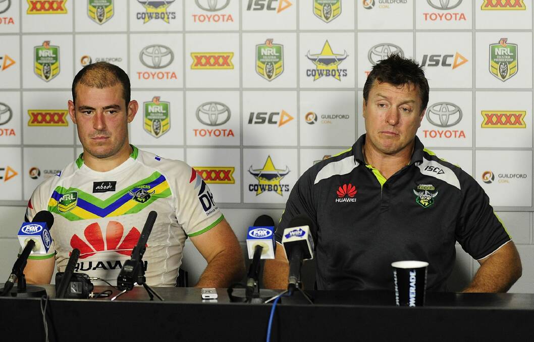 Hard yards: Former captain Terry Campese  and David Furner in tough times at the Canberra Raiders in 2013. Photo: Ian Hitchcock