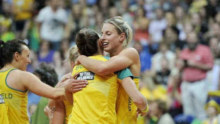 The Diamonds Captain hugs a team mate after winning the Constellation Cup test at the AIS Arena. Photo: Jay Cronan