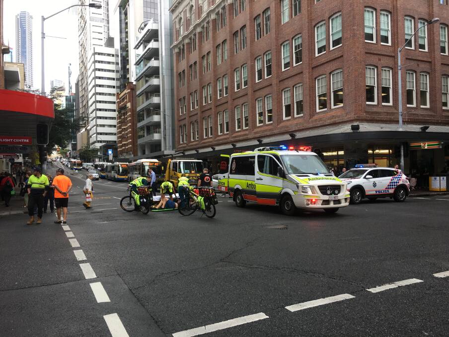 The man was hit at the intersection of Adelaide and Creek streets shortly before 10.45am. Photo: Cameron Atfield