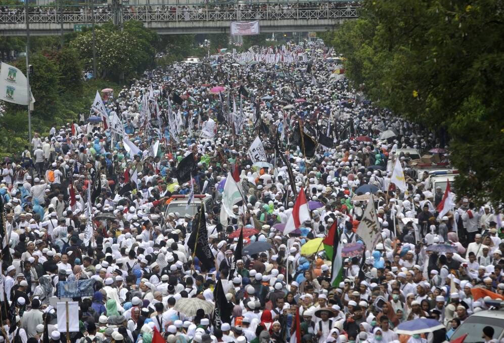 Indonesian Muslims march in a 2016 rally against Jakarta's governor Basuki "Ahok" Tjahaja Purnama, a Christian. Photo: AP