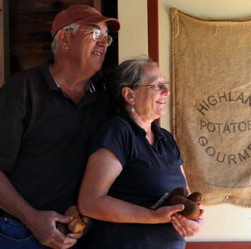 Norm Gair and Robyn Jackson, spud crazy at Highland Gourmet Potatoes near Moss Vale. Photo: Graham Tidy