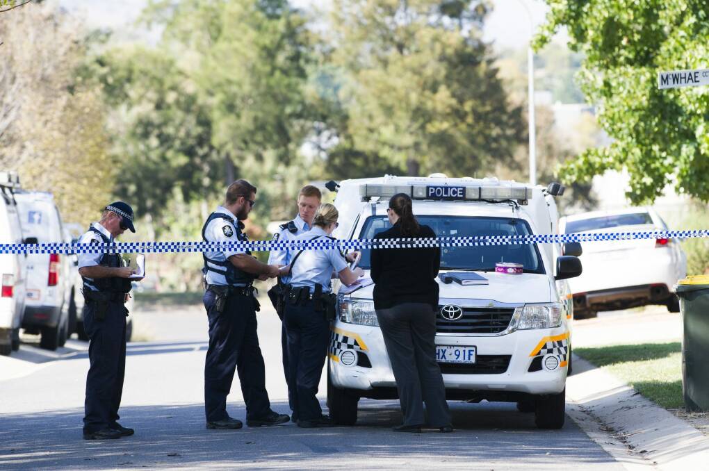 Police guard the crime scene they set up on McWhae Circuit.  Photo: Rohan Thomson