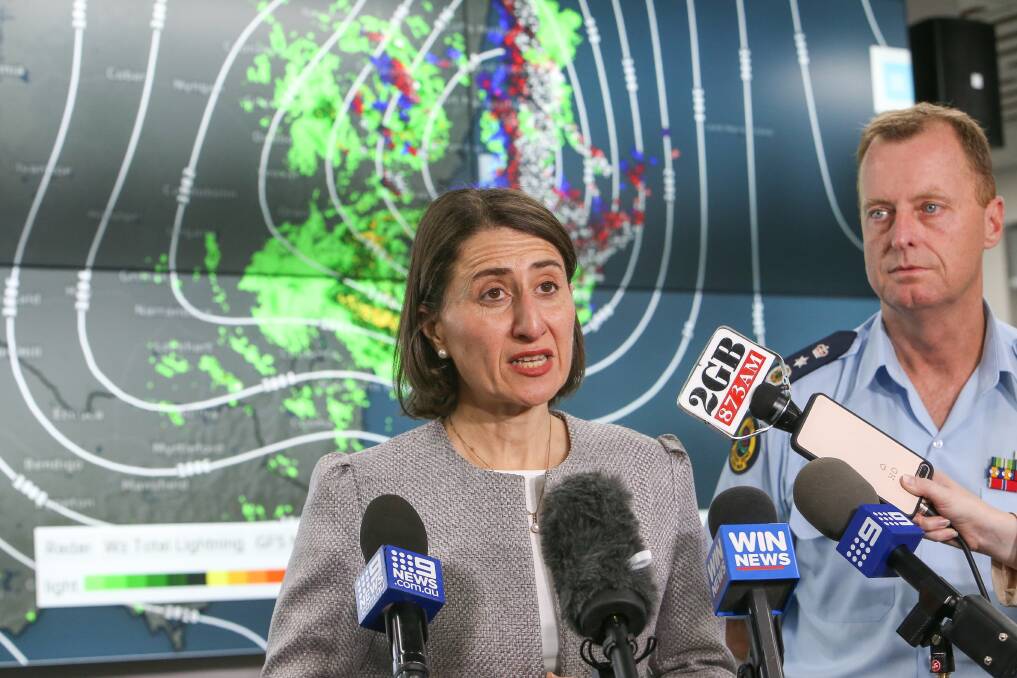 NSW Premier Gladys Berejiklian with State Emergency Service Commissioner Mark Smethurst at the SES headquarters in Wollongong. Photo: Desiree Savage