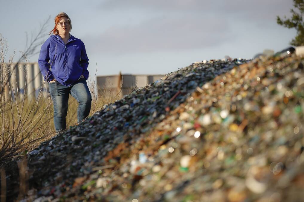 Caitlin Miller, who is at a loss what to do about tonnes of glass she says was dumped on her Bywong property by her father, and has turned to crowdfunding. Photo: Sitthixay Ditthavong