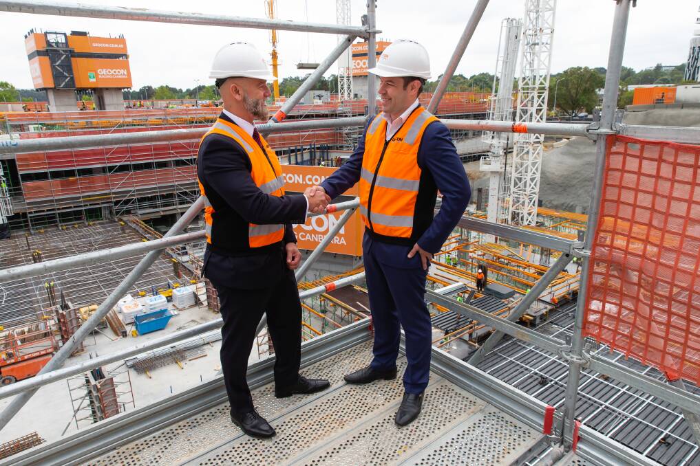 Geocon  managing director Nick Georgalis and Summer Housing chief executive Dan McLennan at the Republic building site in Belconnen where there will be 10  modified apartments for people with disabilities. Photo: Terry Cunningham.