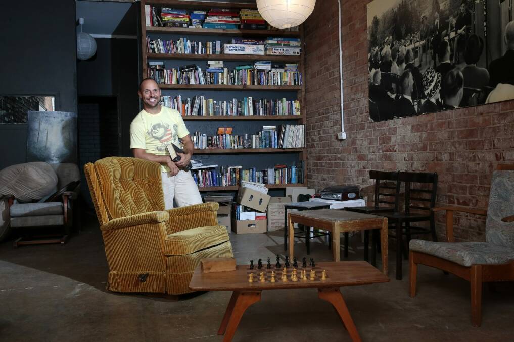  Two Before Ten owner Chris Dennis in the library that will be part of the Bolt Bar and Two Before Ten at Aranda shops. Photo: Jeffrey Chan