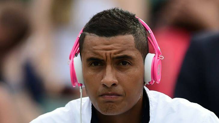 Nick Kyrgios listening to music before playing at Wimbledon Photo: AFP