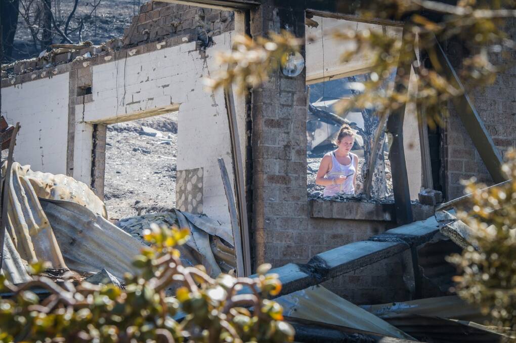 Juvette Jory at what's left of her family's home in Ocean View Terrace. Photo: Karleen Minney