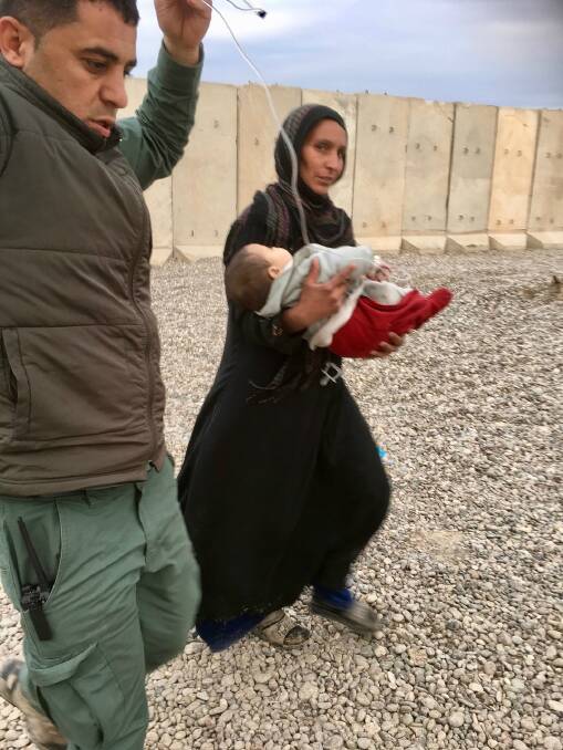 The first patients arrived at a new Australian-managed hospital near Mosul on the weekend, a mother with her four-year-old boy. The child had crush injuries and hypothermia. The boy survived and is now in a ward. Photo: Aspen Medical