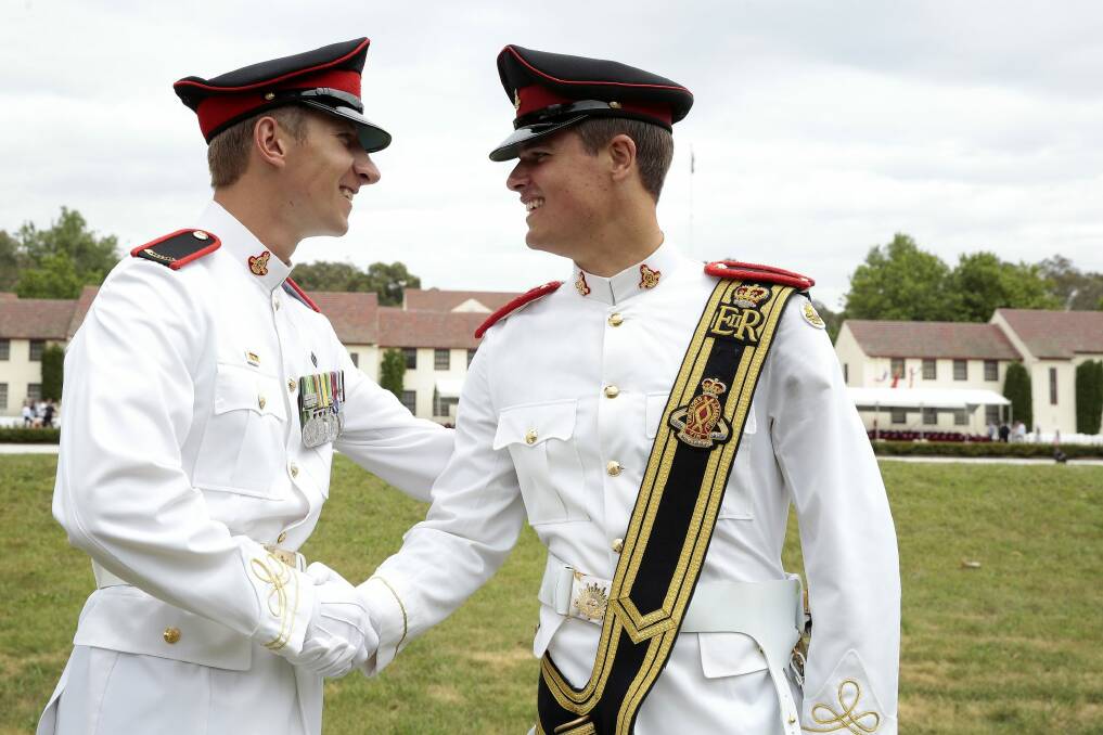  Sword of Honour recipient Ernest Hocking, left, and Queen's Medal recipient Tyler Bosch, members of the 2015 graduating class at the Royal Military College, Duntroon. Photo: Jeffrey Chan
