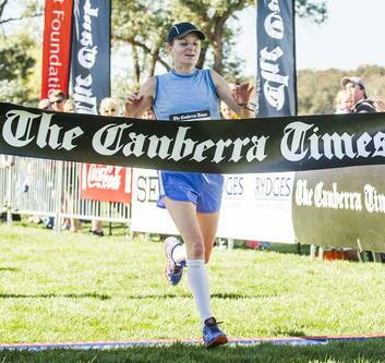 First female finisher Fleur Flanery crosses the line. Photo: Rohan Thomson.
