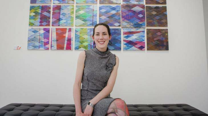 Emily Casey with her work <i>Long Way Country</i>, part of the exhibition Haptic Gaze, at Tuggeranong Arts Centre. Photo: Jamila Toderas