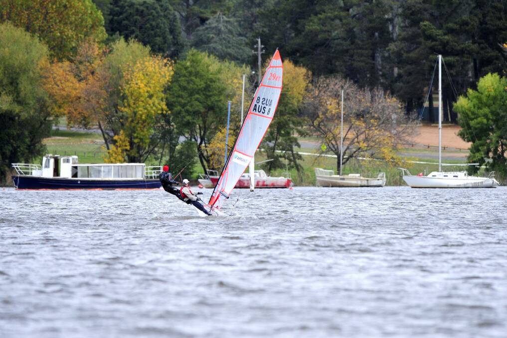 Some Canberrans made the most of Monday's windy weather on Lake Burley Griffin. Photo: Jeffrey Chan