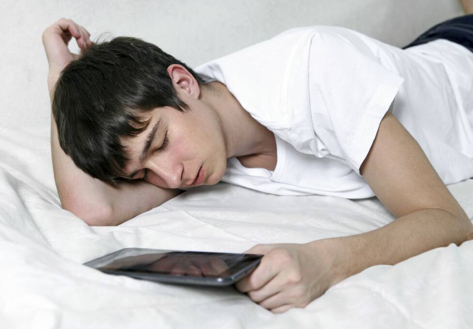 Teenagers' use of mobile devices is eating into their sleep. Photo: Steve Cassell