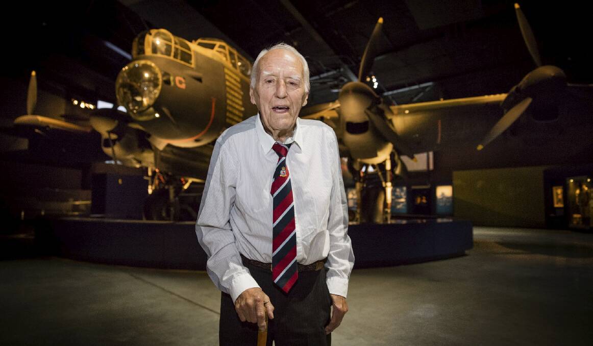 Ex-Flying Officer Leonard Bence, 94,  of Burra, in South Australia, with the G for George  Avro Lancaster B1 exhibit at the Australian War Memorial. Mr Bence flew 30 missions in Lancasters during World War II. Photo: Steve Burton