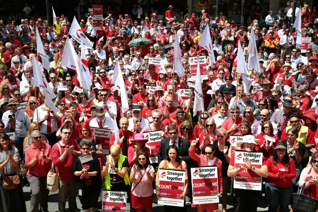 Public servants protest against low government pay offers at a rally in Canberra last year. Photo: Jeffrey Chan