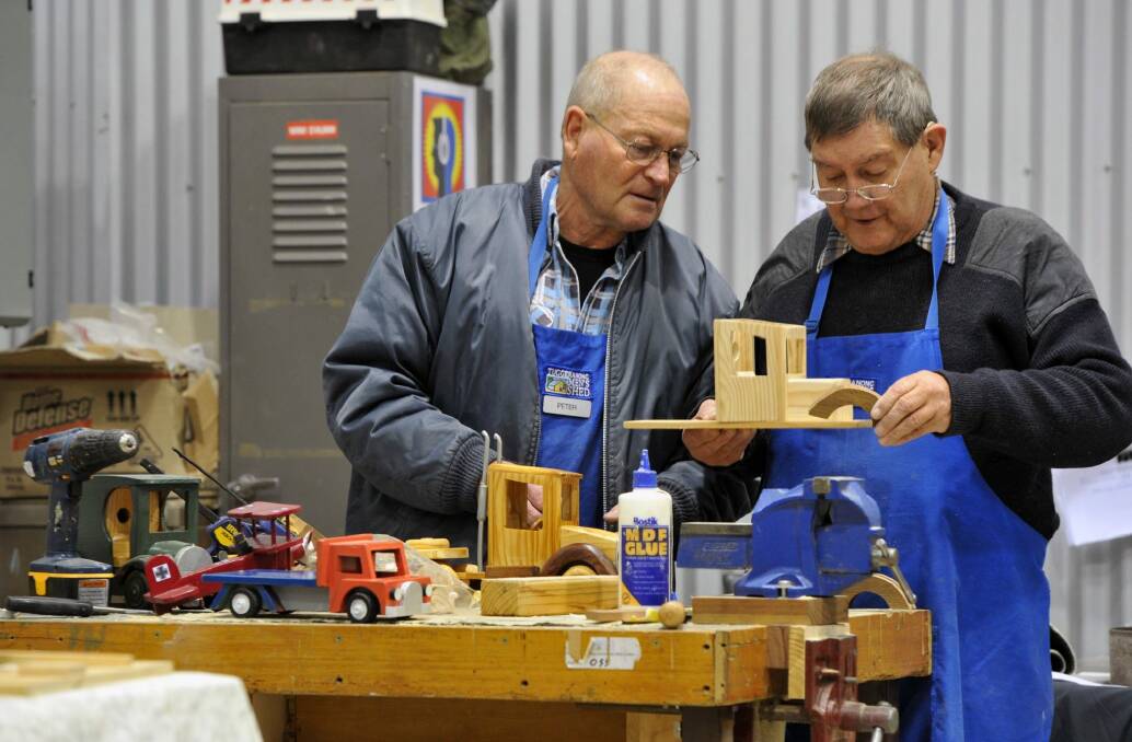 Peter Roe and Malcolm Mongan at the Tuggeranong Men's Shed last year. Photo: Graham Tidy.